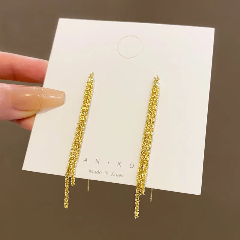Boucles d’Oreilles Pendantes Elégantes Dorées