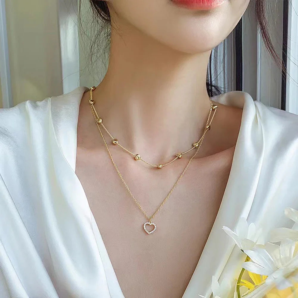 Collier Double Rang Boules et Cœur